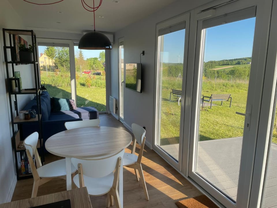 Communal lounge/ TV room, View (from property/room), Seating area, Dining area