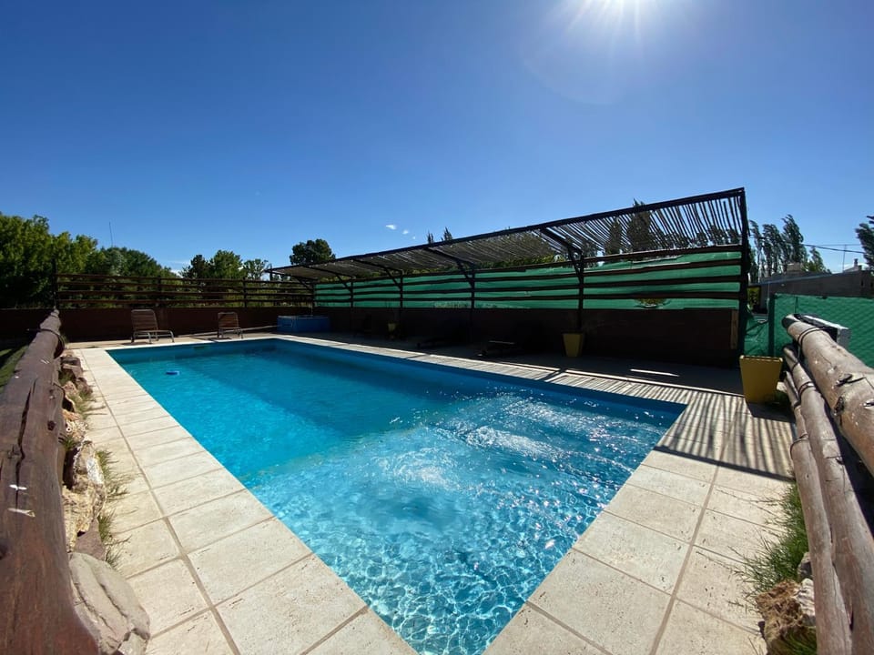 Swimming pool, sunbed