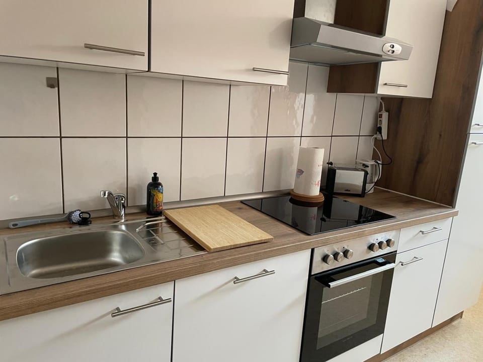Kitchen or kitchenette, stove