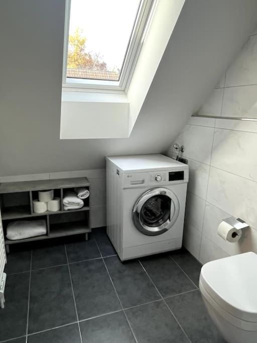 Bathroom, washing machine, dryer