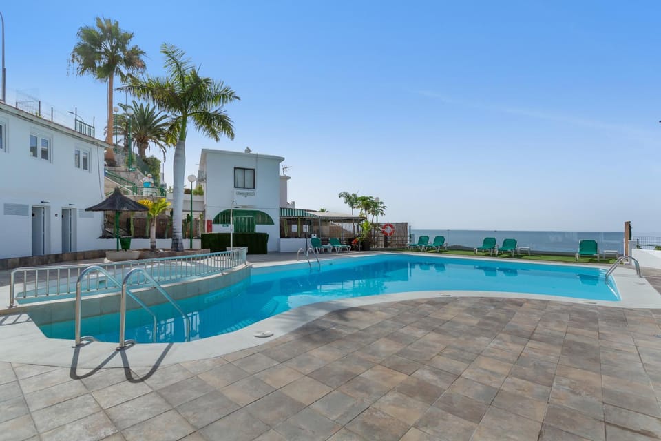 Property building, Living room, Swimming pool