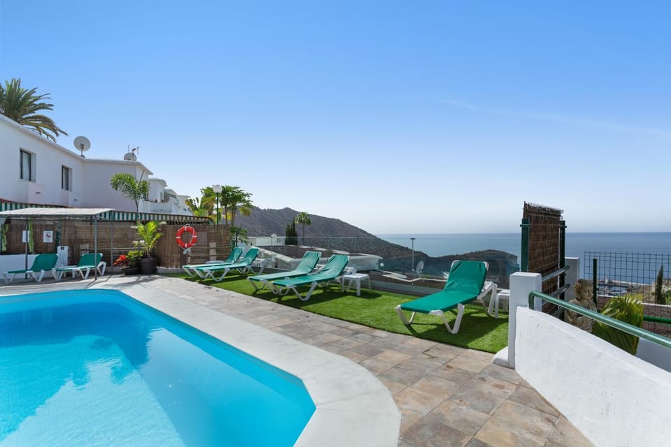 Property building, Living room, Swimming pool
