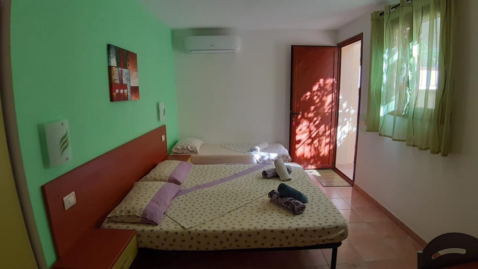 Photo of the whole room, Bedroom, towels, air conditioner