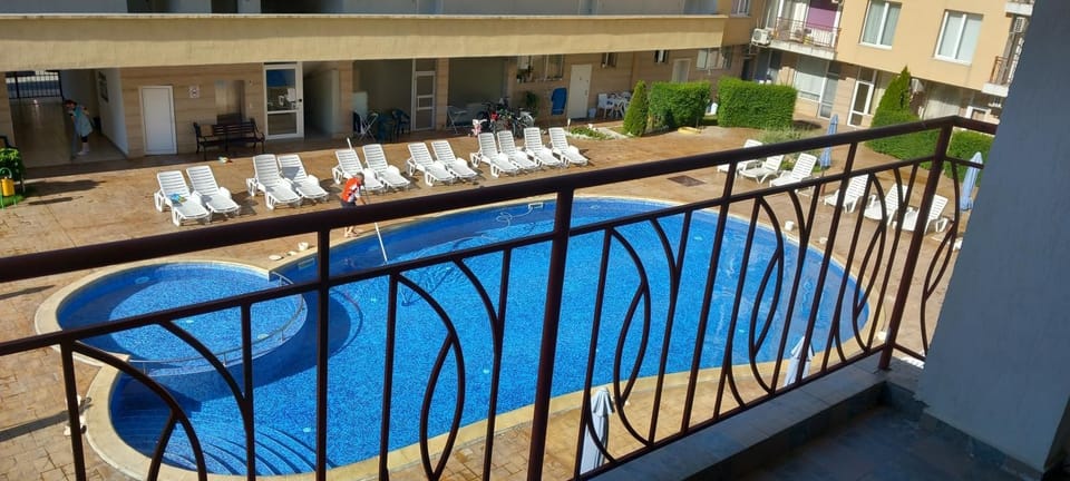 Property building, Patio, Day, View (from property/room), Balcony/Terrace, Pool view, Swimming pool, sunbed