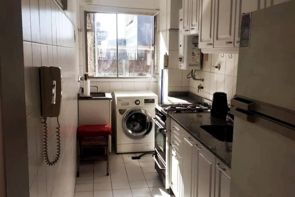 Kitchen or kitchenette, stove, washing machine