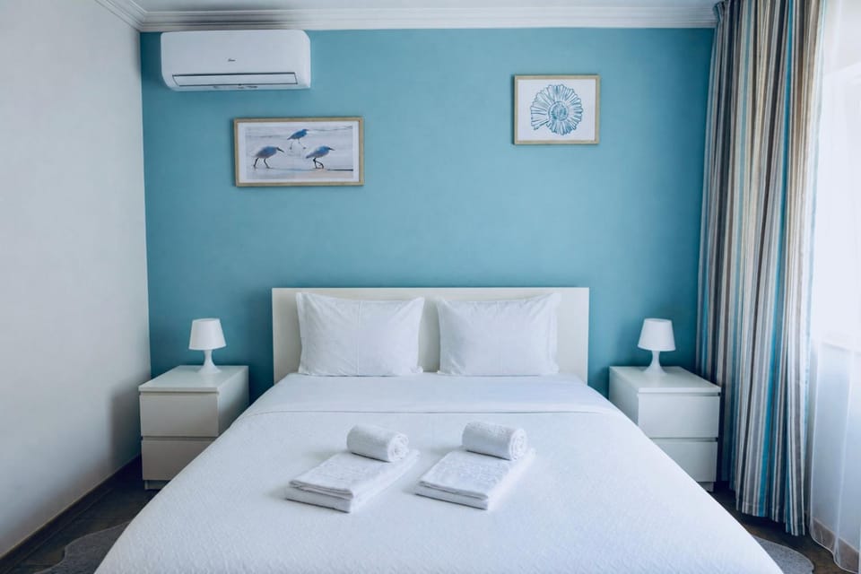 Bed, Photo of the whole room, Bedroom, towels, air conditioner
