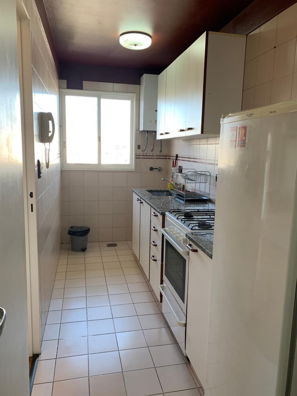 Kitchen or kitchenette, oven