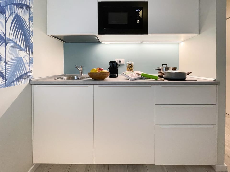 Kitchen or kitchenette, stove