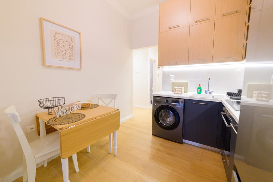 Kitchen or kitchenette, dishwasher, stove, washing machine
