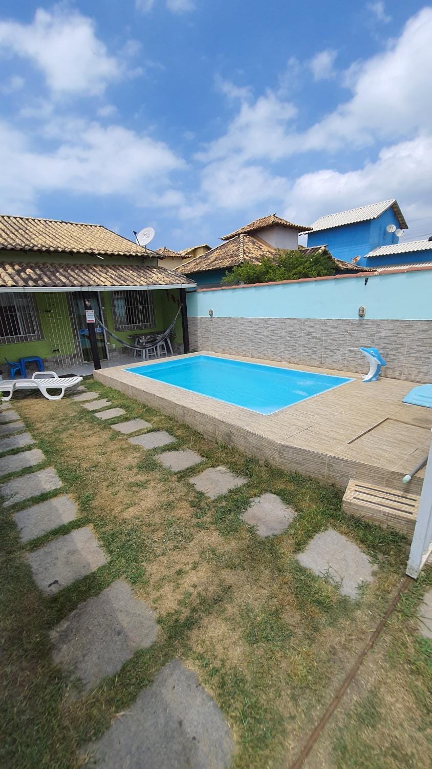 Property building, Day, Swimming pool, Parking, sunbed