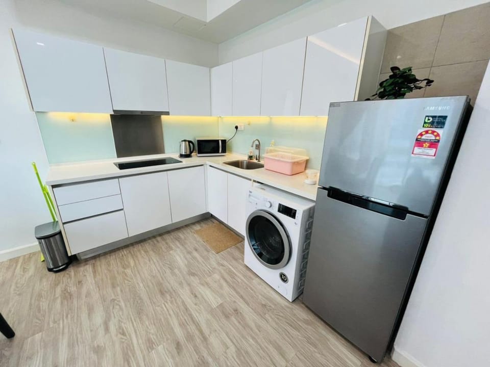 Kitchen or kitchenette, stove, washing machine