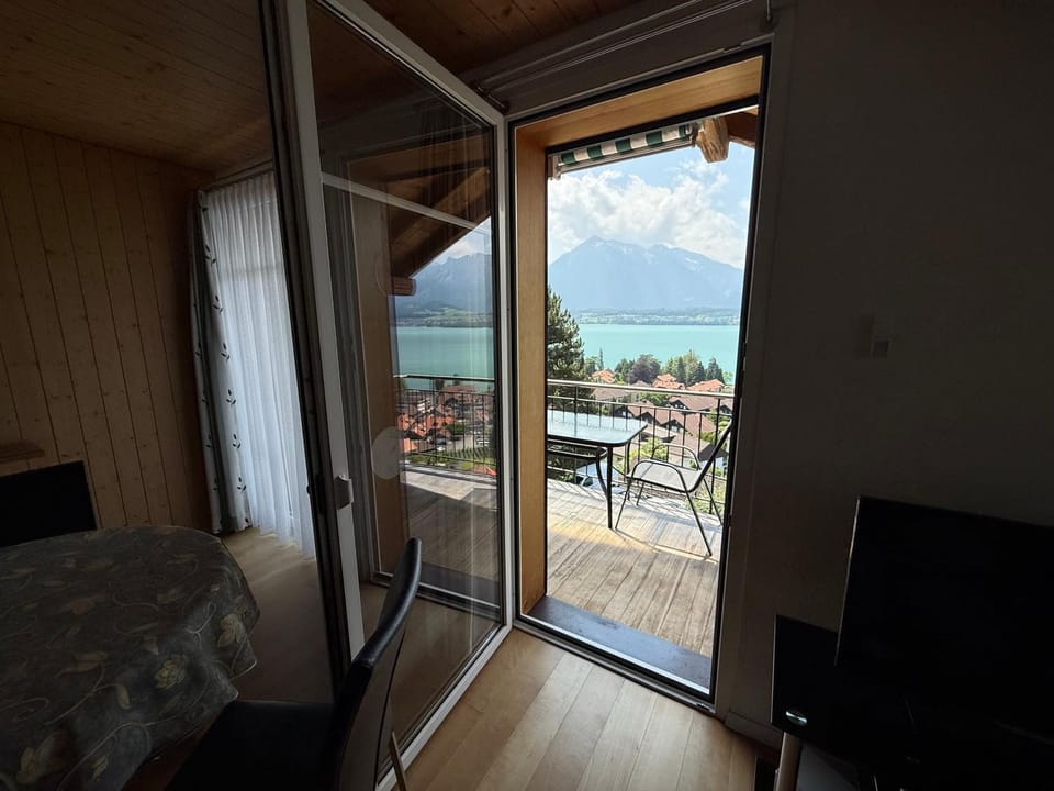 Day, Natural landscape, View (from property/room), Living room, Dining area, Lake view, Mountain view