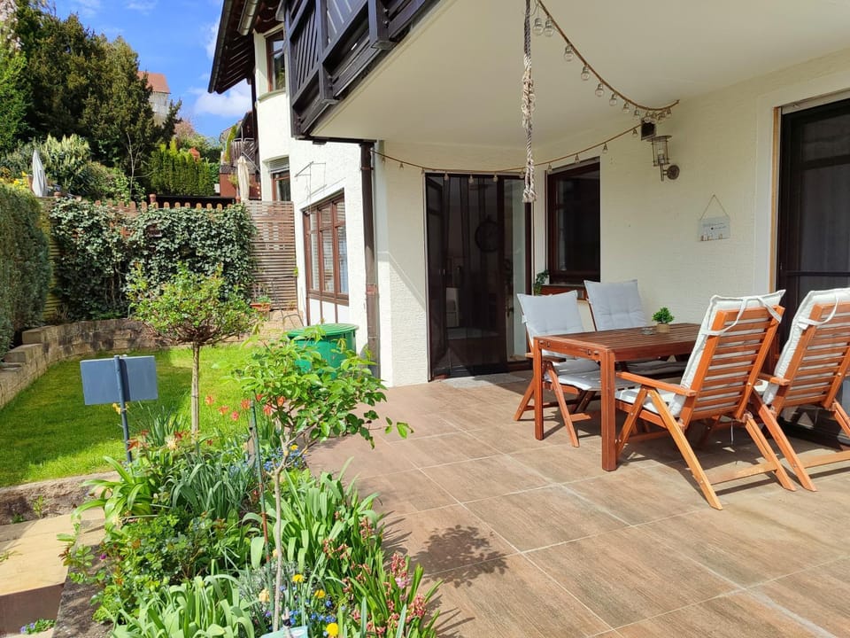 Property building, Spring, Day, Garden, View (from property/room), Balcony/Terrace, Seating area, Garden view
