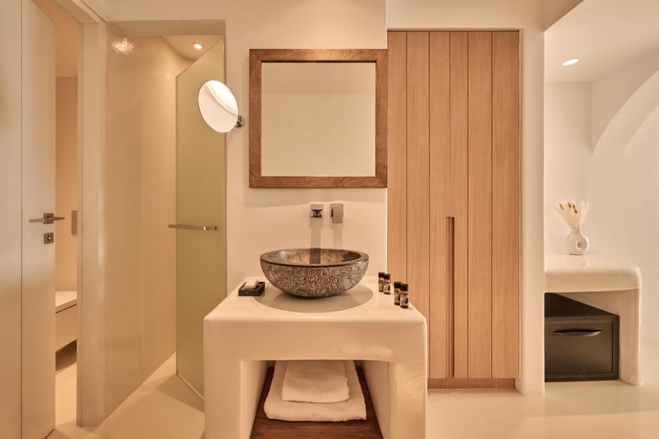 Shower, Toilet, Bathroom, Decorative detail, minibar, towels, wardrobe