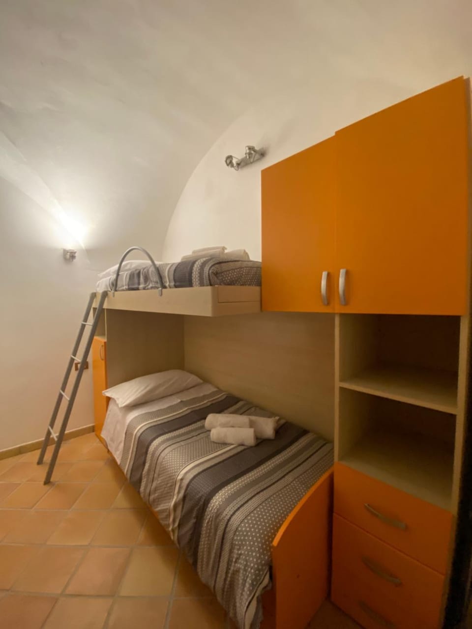 bunk bed, towels, wardrobe