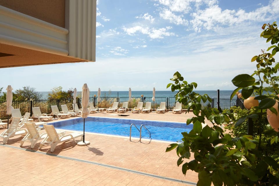 Patio, Day, Natural landscape, Balcony/Terrace, Beach, Pool view, Sea view, Swimming pool, sunbed