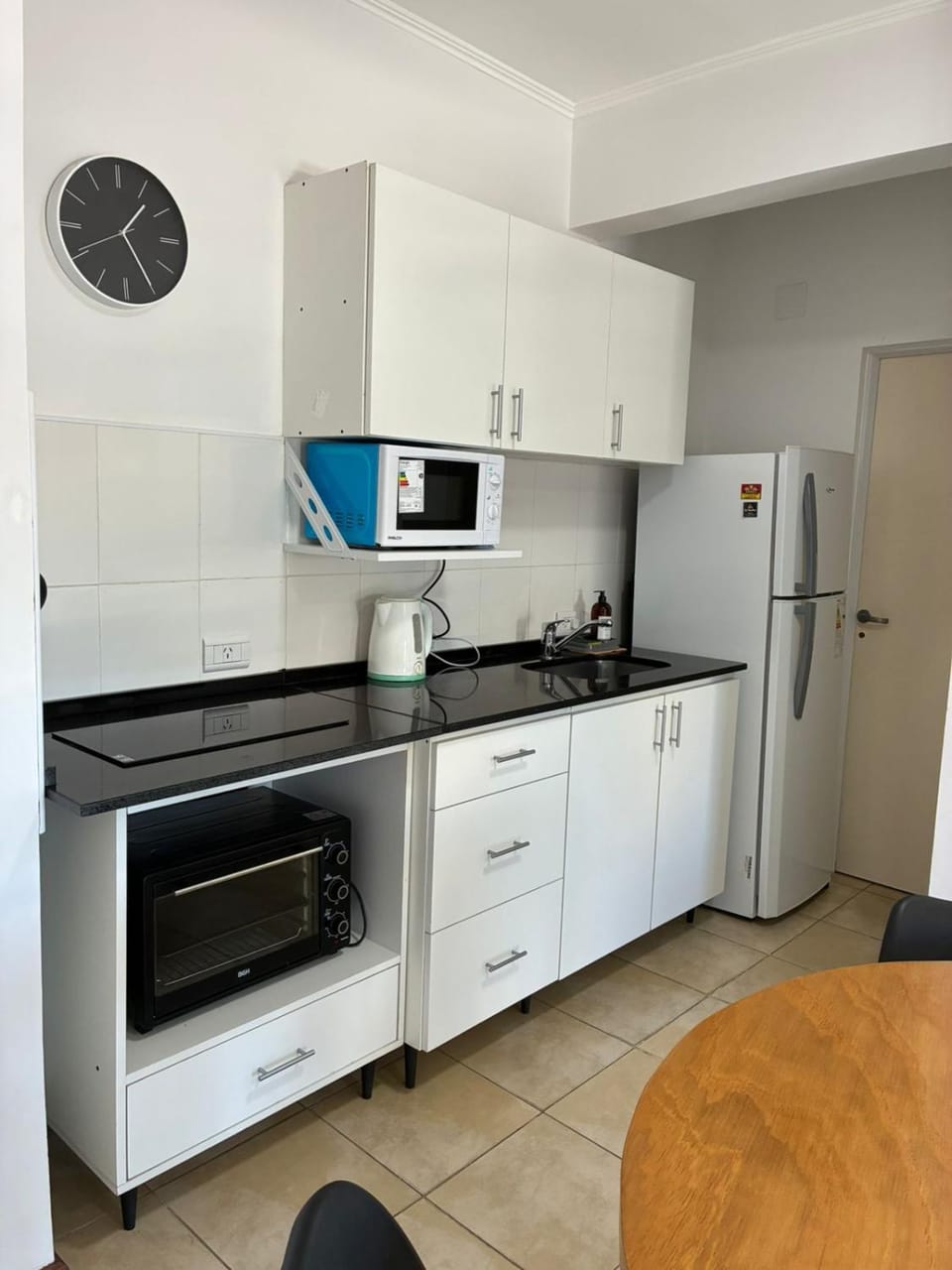 Kitchen or kitchenette, microwave, oven, stove, kitchen