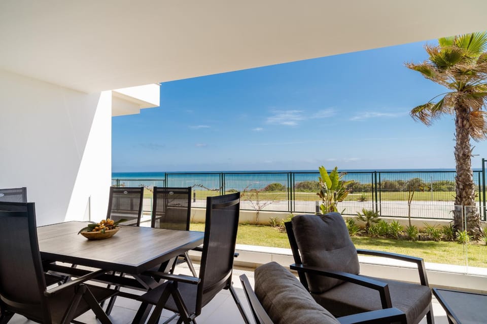 View (from property/room), Balcony/Terrace, Balcony/Terrace, Seating area, Beach, Sea view