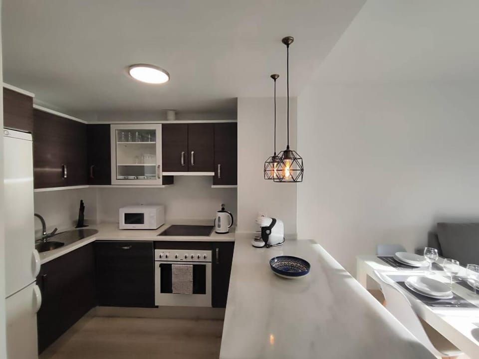 Kitchen or kitchenette, stove
