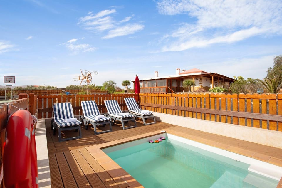 Property building, Living room, Swimming pool