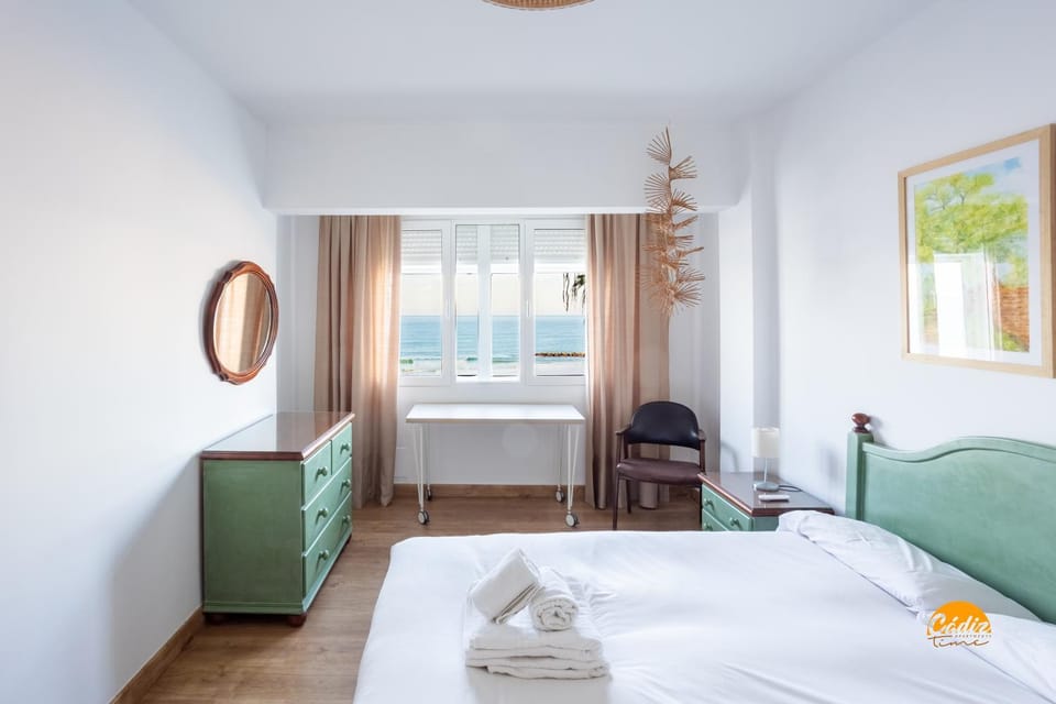 Bed, Seating area, Bedroom, Sea view, towels, wardrobe