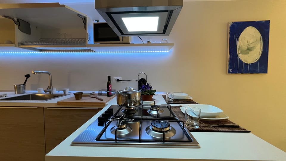 Kitchen or kitchenette, stove