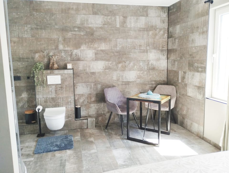 Luxe kamer met stoomsauna bij B&B Gezond aan Zee - Toegang bad en buiten Wellness tegen meerprijs Bed and Breakfast in Ouddorp