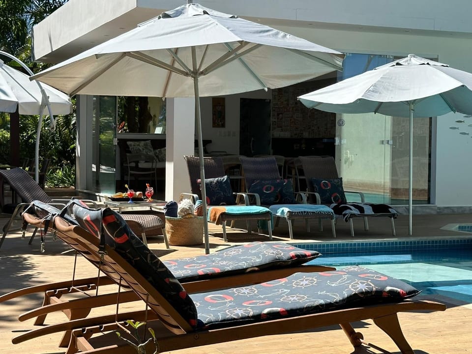 Swimming pool, sunbed