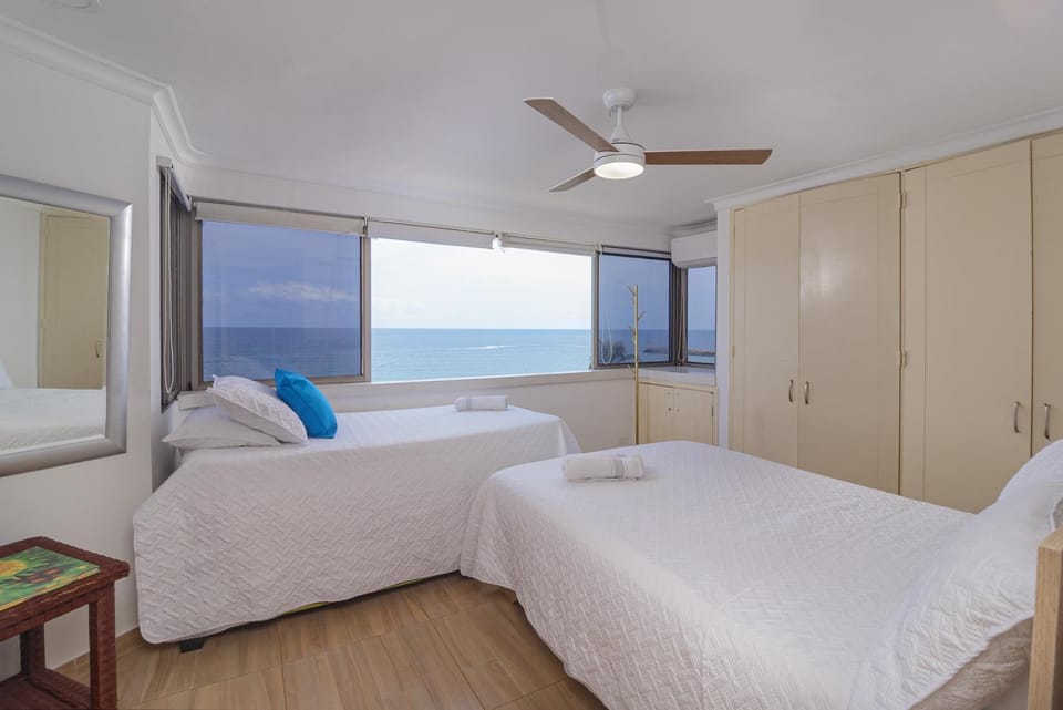 Bed, Decorative detail, Sea view, wardrobe