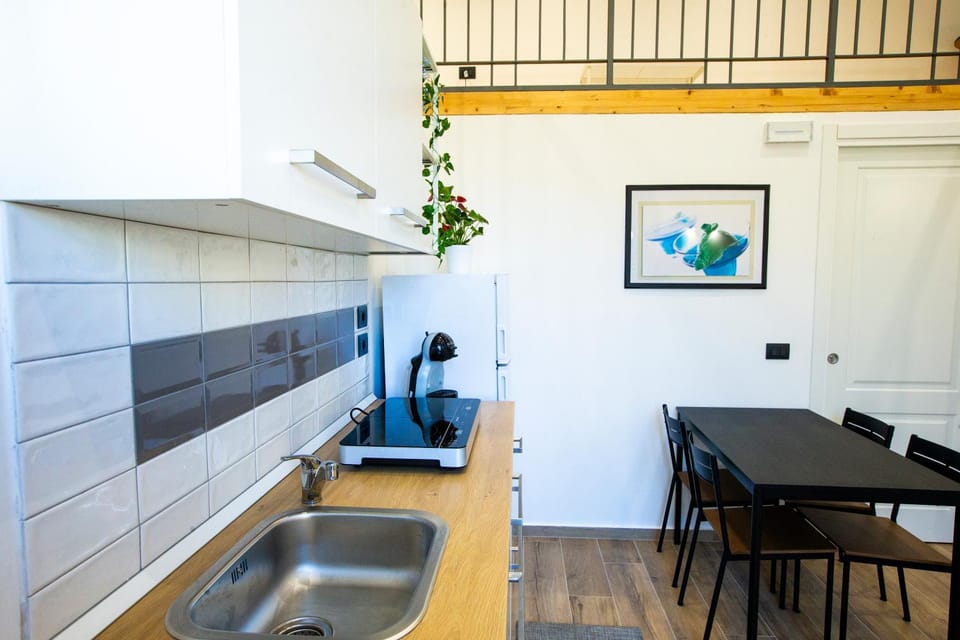 Kitchen or kitchenette, Living room, Seating area, Dining area, air conditioner