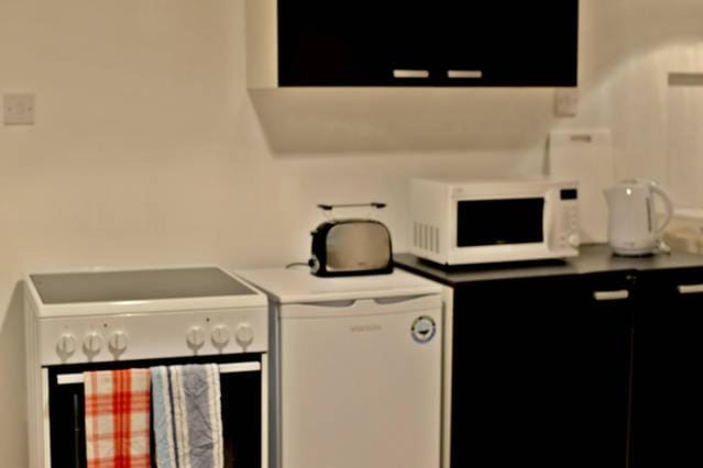 Kitchen or kitchenette, toaster