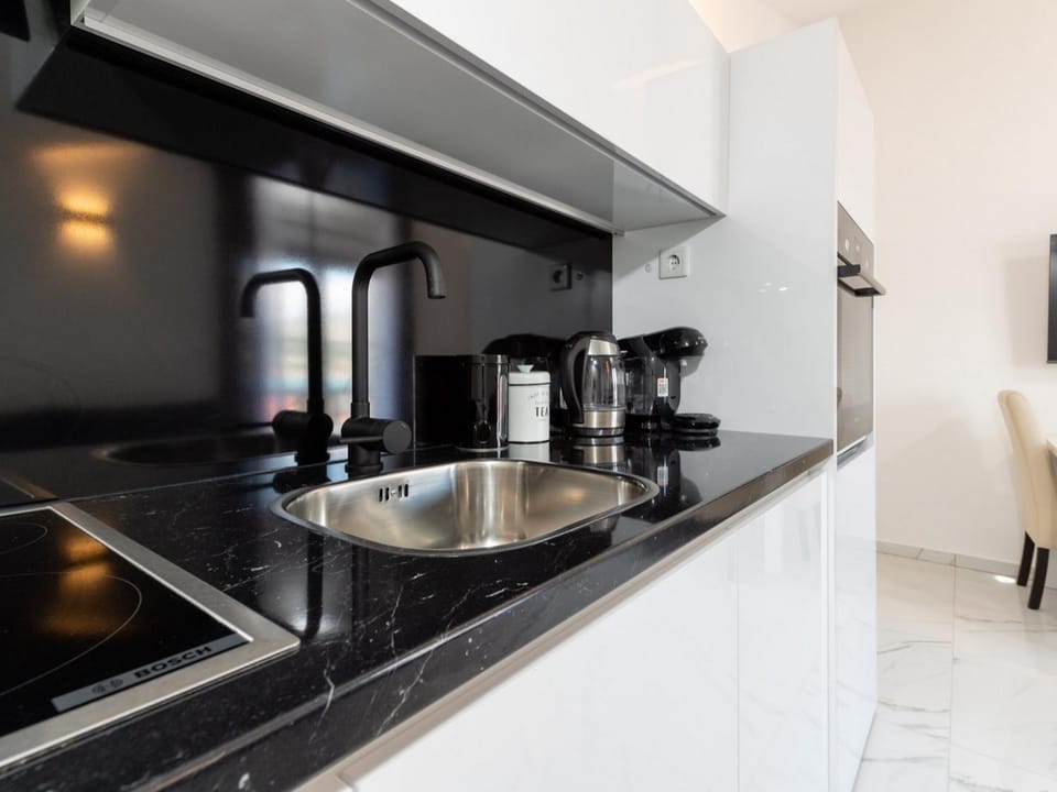 Kitchen or kitchenette, stove