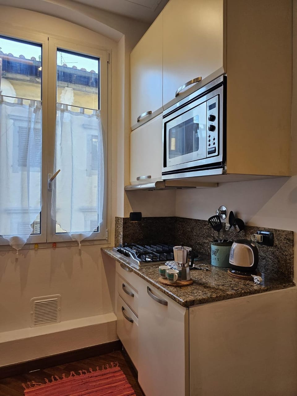 Kitchen or kitchenette, stove