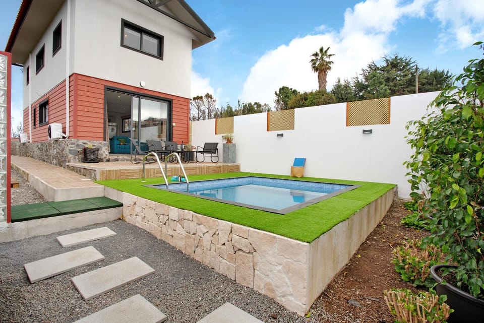 Property building, Living room, Swimming pool
