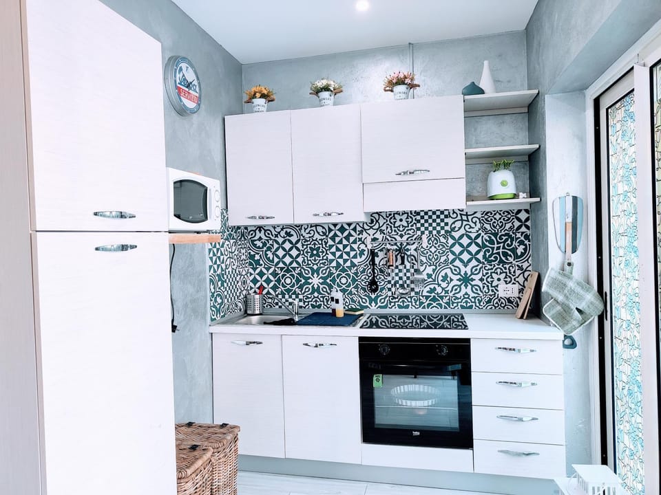 Kitchen or kitchenette, stove