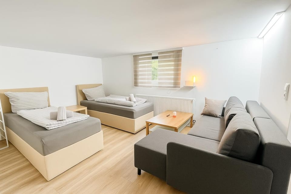 Bed, Living room, Seating area, Bedroom