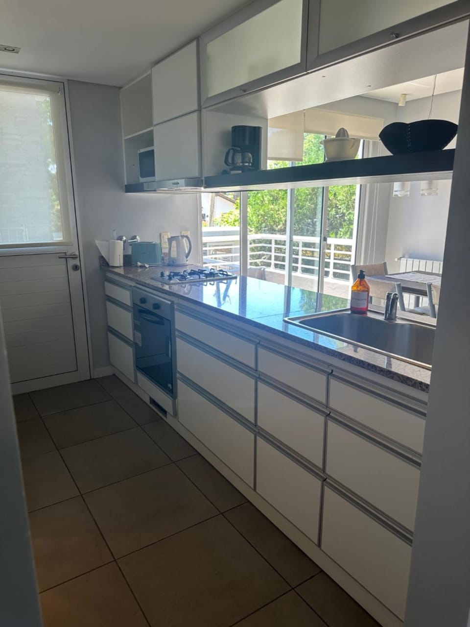 Kitchen or kitchenette, oven, stove, toaster