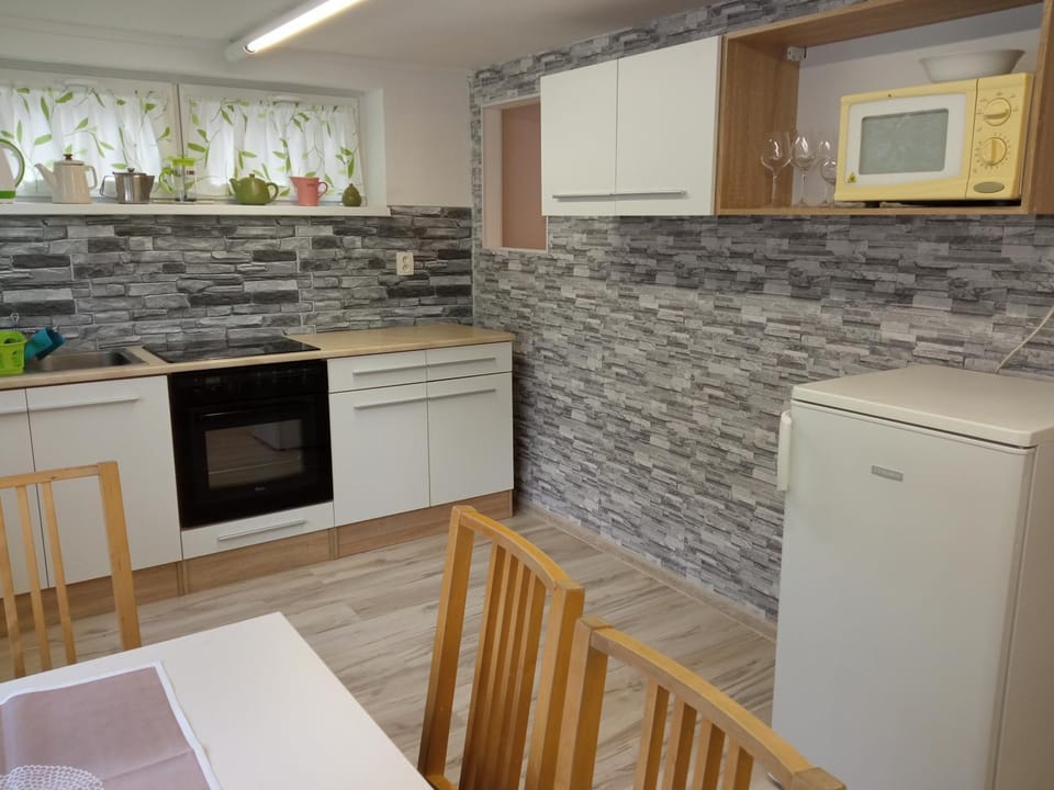 Kitchen or kitchenette, stove