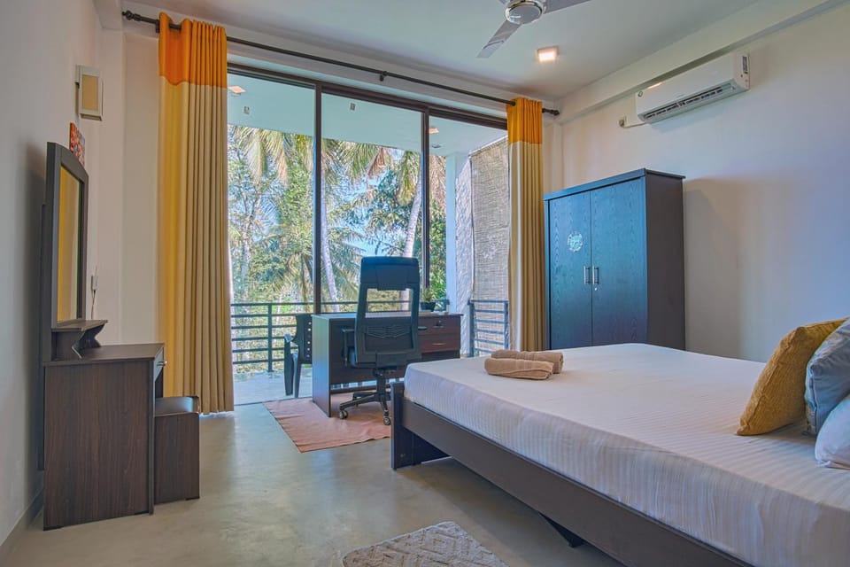 Bed, Balcony/Terrace, Photo of the whole room, Seating area, Bedroom, Garden view, wardrobe, air conditioner