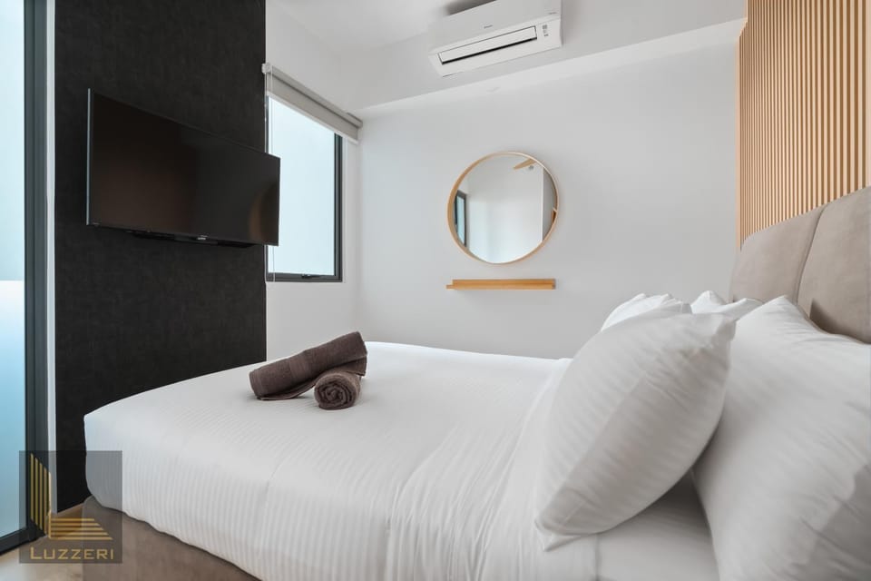 Photo of the whole room, Bedroom, towels, air conditioner