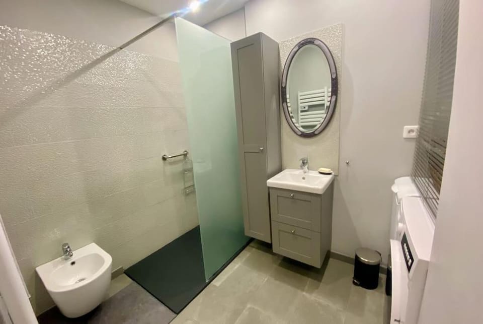 Bathroom, bidet, towels