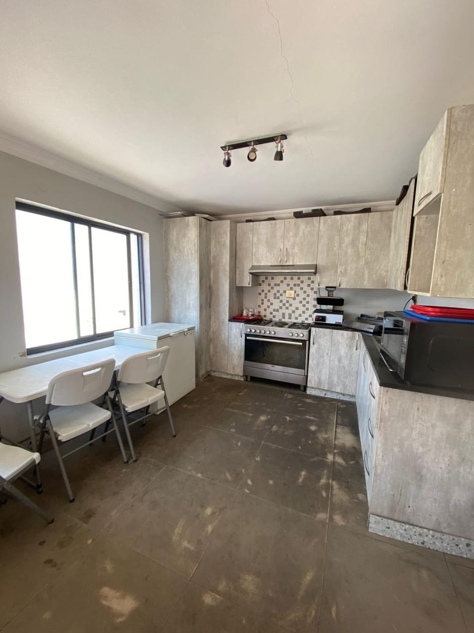 Kitchen or kitchenette, stove