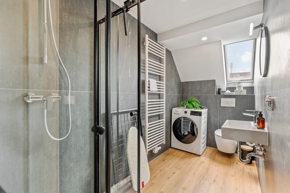 Shower, Toilet, Bathroom, towels, washing machine, dryer