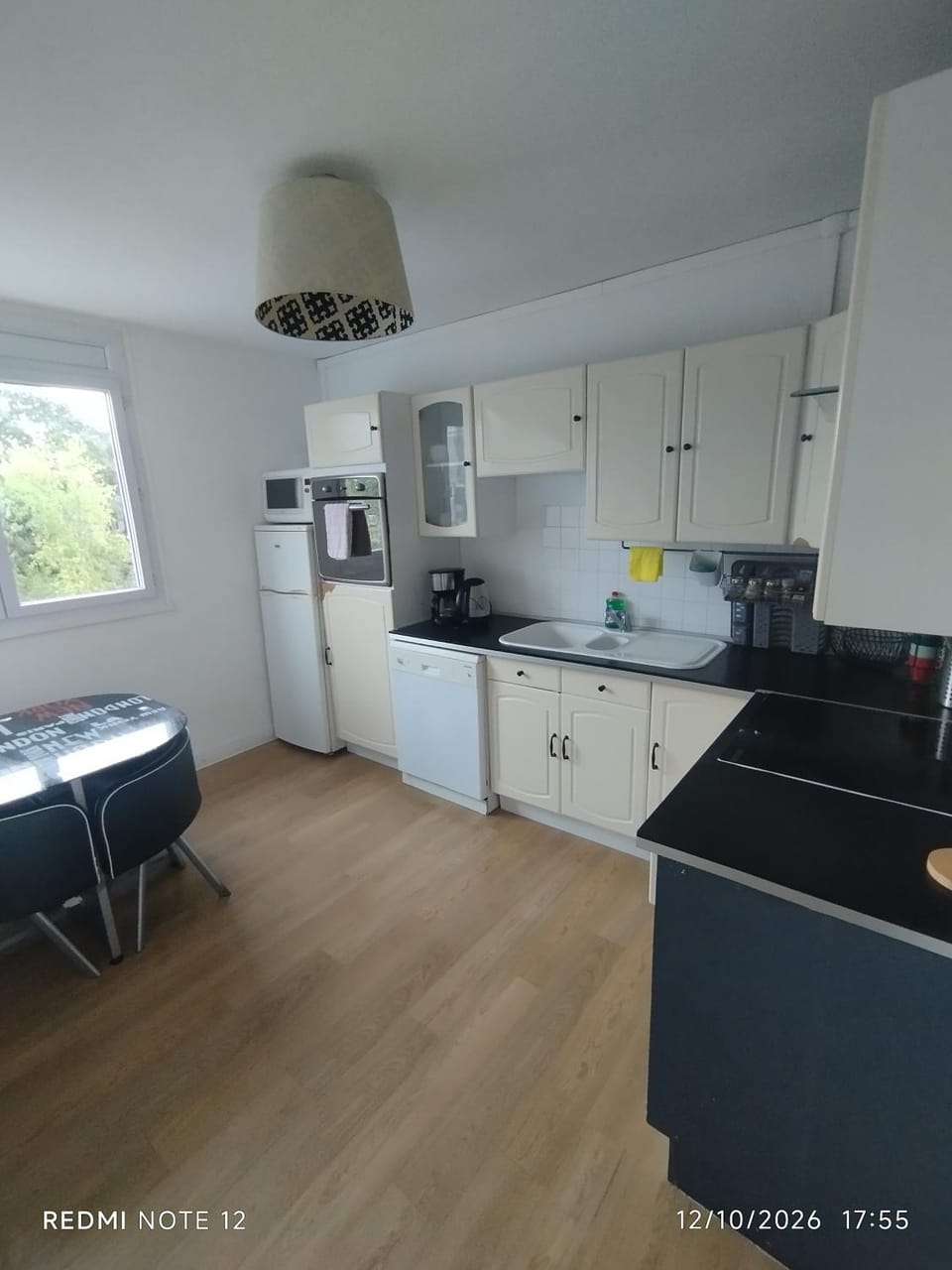 Kitchen or kitchenette, dishwasher, oven, stove