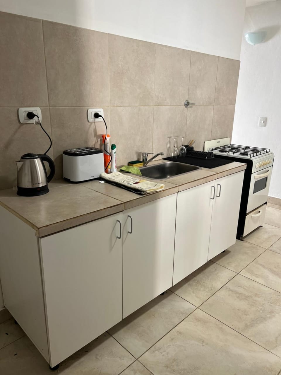 Kitchen or kitchenette, oven, stove, toaster