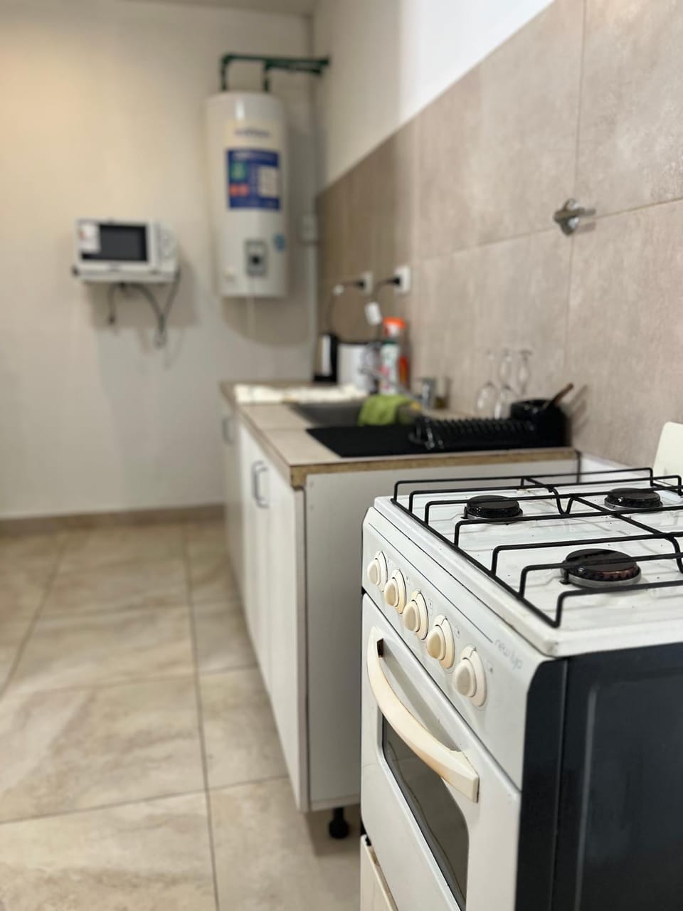 Kitchen or kitchenette, oven, stove, toaster