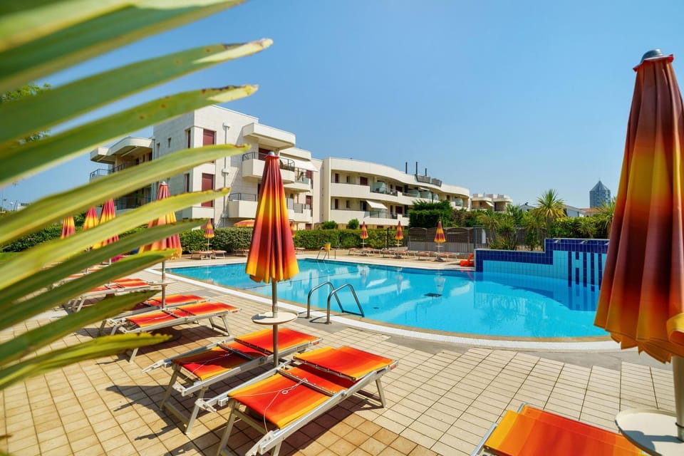 Property building, Living room, Swimming pool