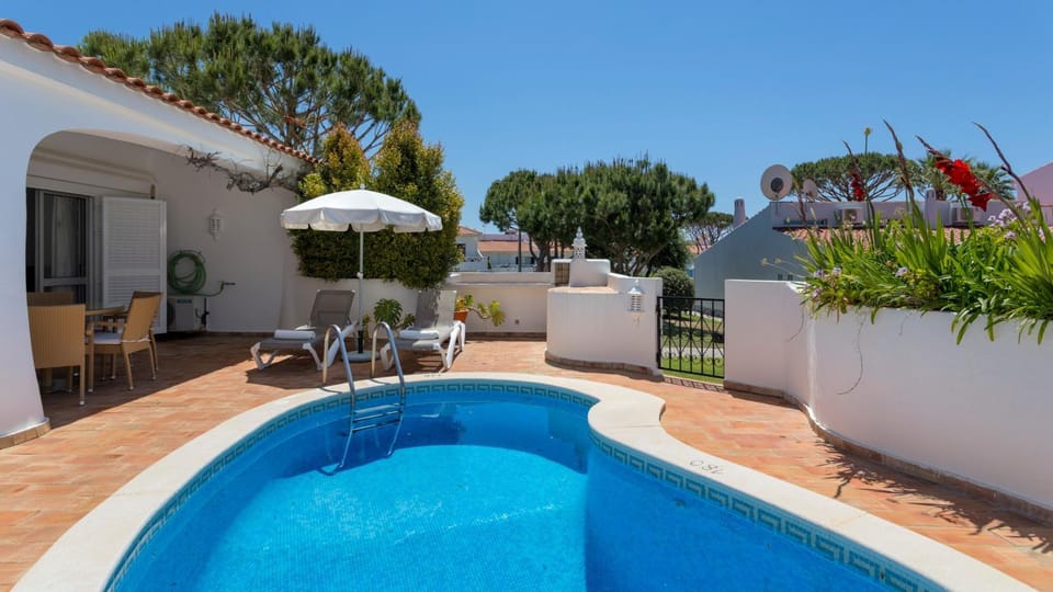 Property building, Living room, Swimming pool
