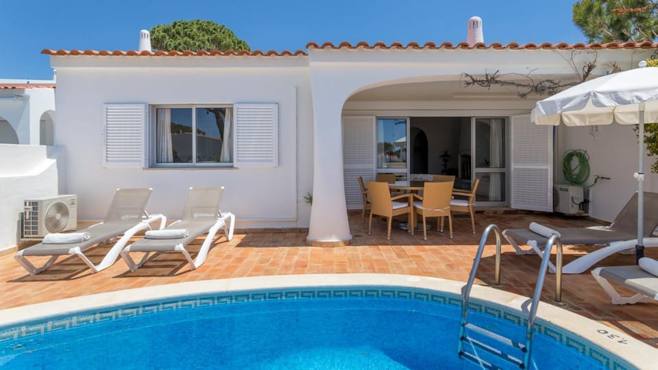 Property building, Living room, Swimming pool