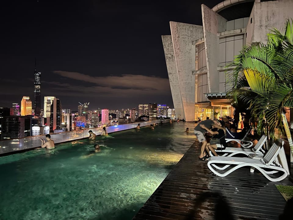 Property building, Night, View (from property/room), City view, Pool view, Swimming pool